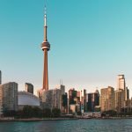 Beautiful view of Toronto's skyline featuring the iconic CN Tower during sunset.